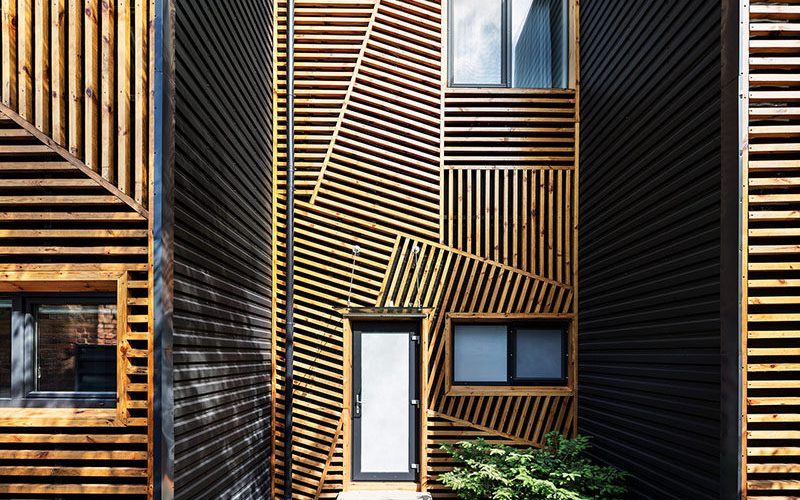 These Townhouses Feature A Creative And Artistic Wood Exterior