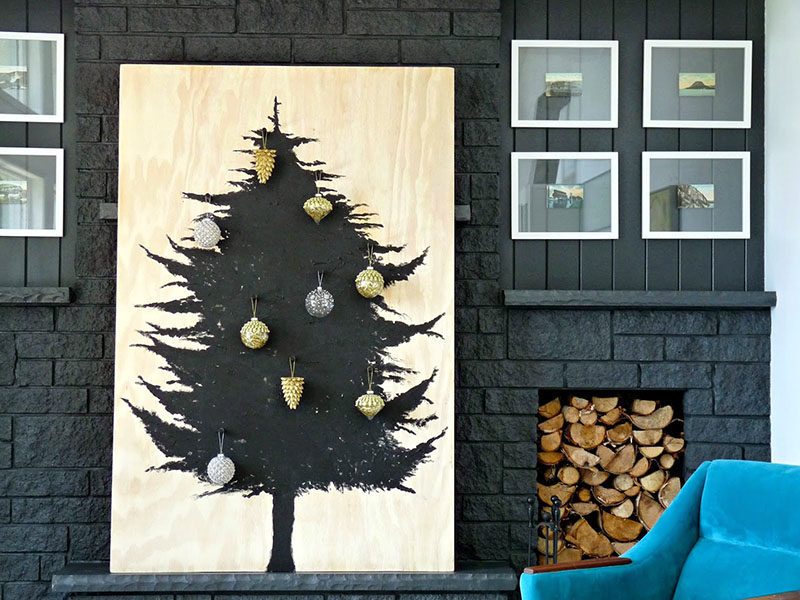 Christmas Decor Ideas - 14 DIY Alternative Modern Christmas Trees // This Scandinavian inspired DIY Christmas tree is pretty easy to create and creates a dramatic look.
