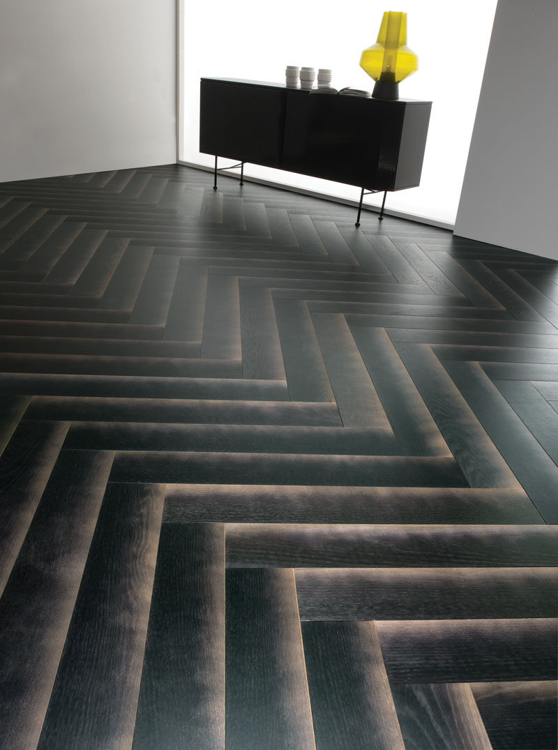 This black wood flooring is designed to have a gradient shadow.