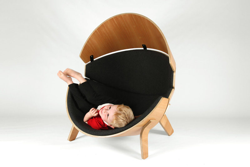 12 Comfy Chairs Perfect For Relaxing In // This wood framed chair is lined with felt-covered cushions to create a quieter and more relaxing place for kids to get comfy and unwind in.