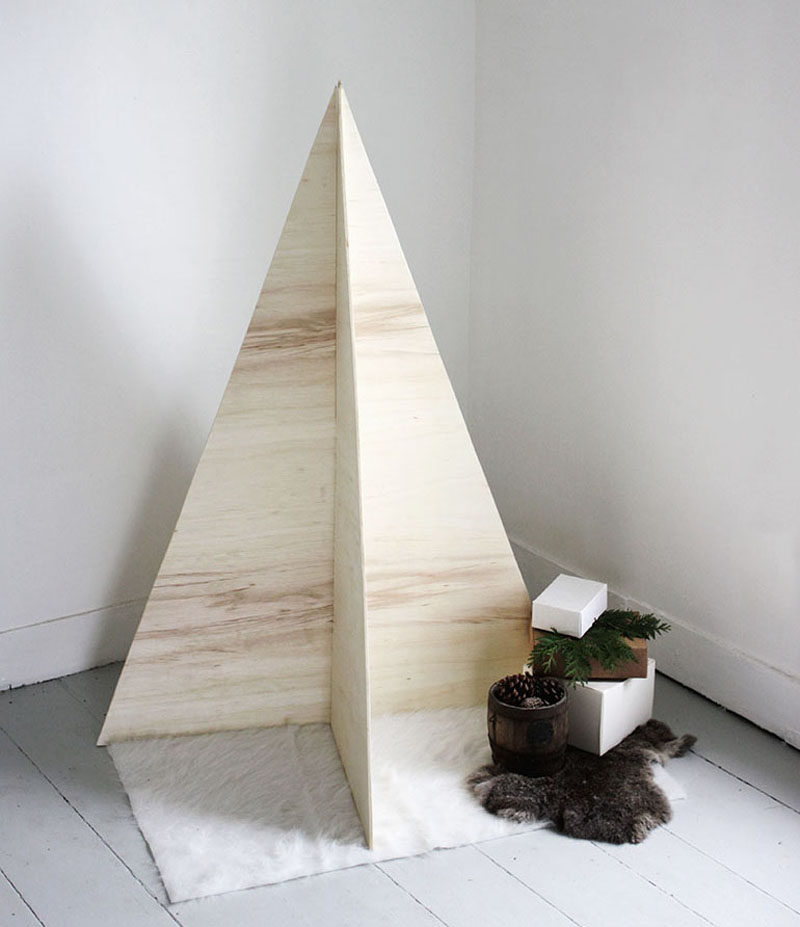 Christmas Decor Ideas - 14 DIY Alternative Modern Christmas Trees // Perfect for minimalists, this tree requires nothing more than two sheets of plywood and a saw.