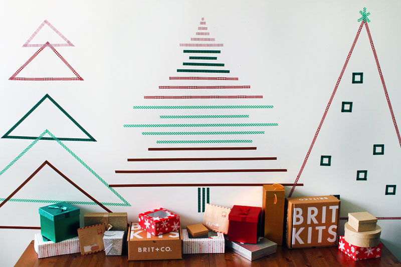 Christmas Decor Ideas - 14 DIY Alternative Modern Christmas Trees // Simple trees made from strips of washi tape are an easy way to create Christmas tree shapes on your walls that can be as simple or as elaborate as you like.