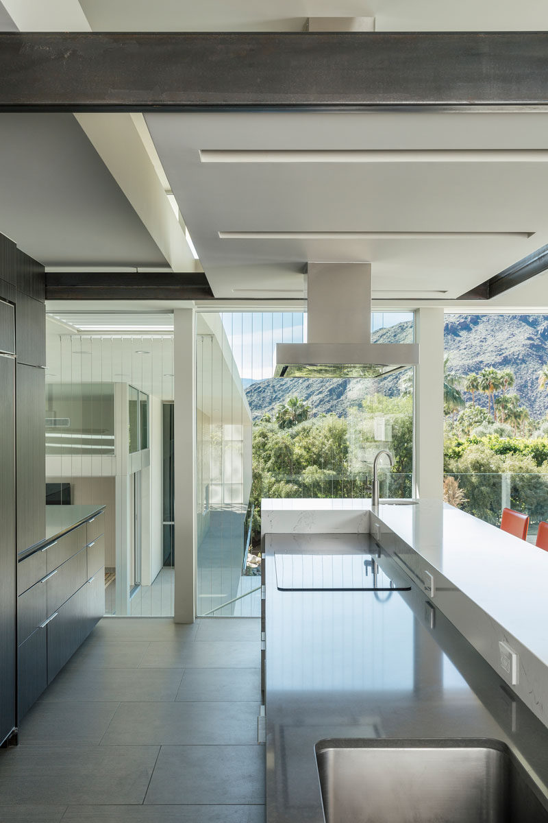This kitchen with undermount sink has views of the mountains.
