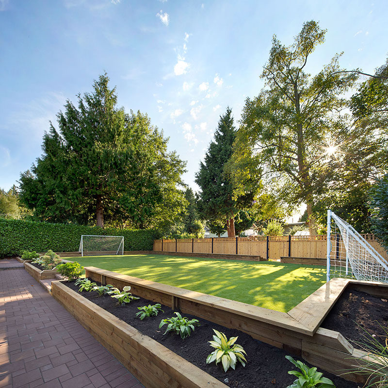 Landscaping Ideas - Liven Up Your Backyard With Some Games // This backyard has a mini soccer field.