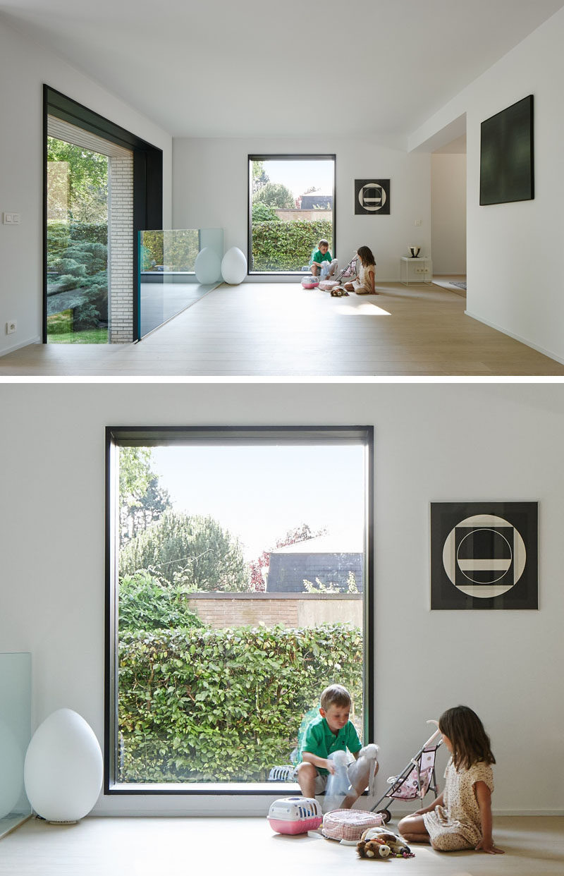 Black framed windows and light wood floors have been included in the updated design of this home.