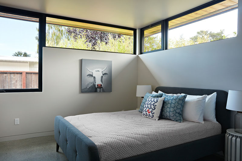 The windows in this bedroom follow the roof line and provide an abundance of natural light.