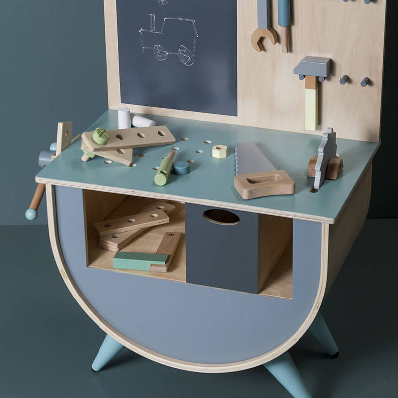 Gift Guide - 30+ Gift Ideas For The Modern Kid In Your Life // A small workbench is the perfect gift for the future carpenter. 