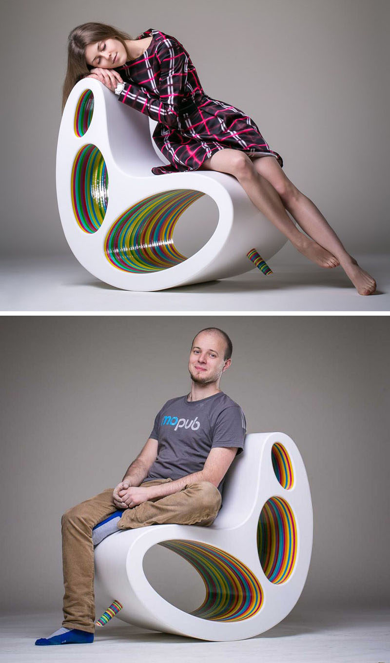 Furniture Ideas - 14 Awesome Modern Rocking Chair Designs // Colorfully painted wood can be seen through the holes in the body of this rocking chair and on the front peg that can be removed for more intense rocking.