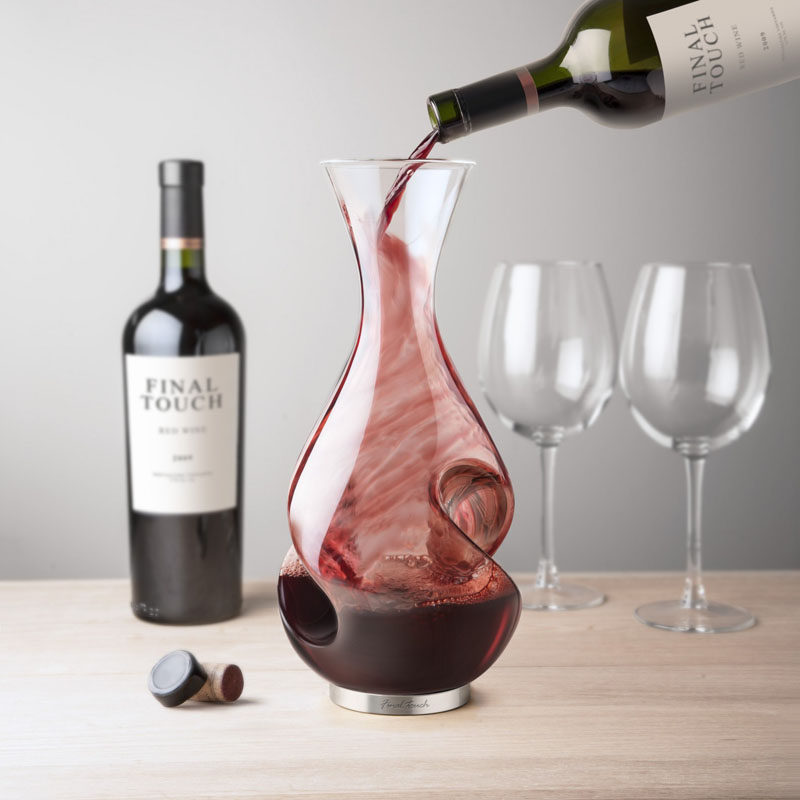 10 Unique Modern Wine Decanters // The curves on the sides of this decanter naturally swirl the wine around as it flows down the sides helping to aerate and oxygenate the wine.