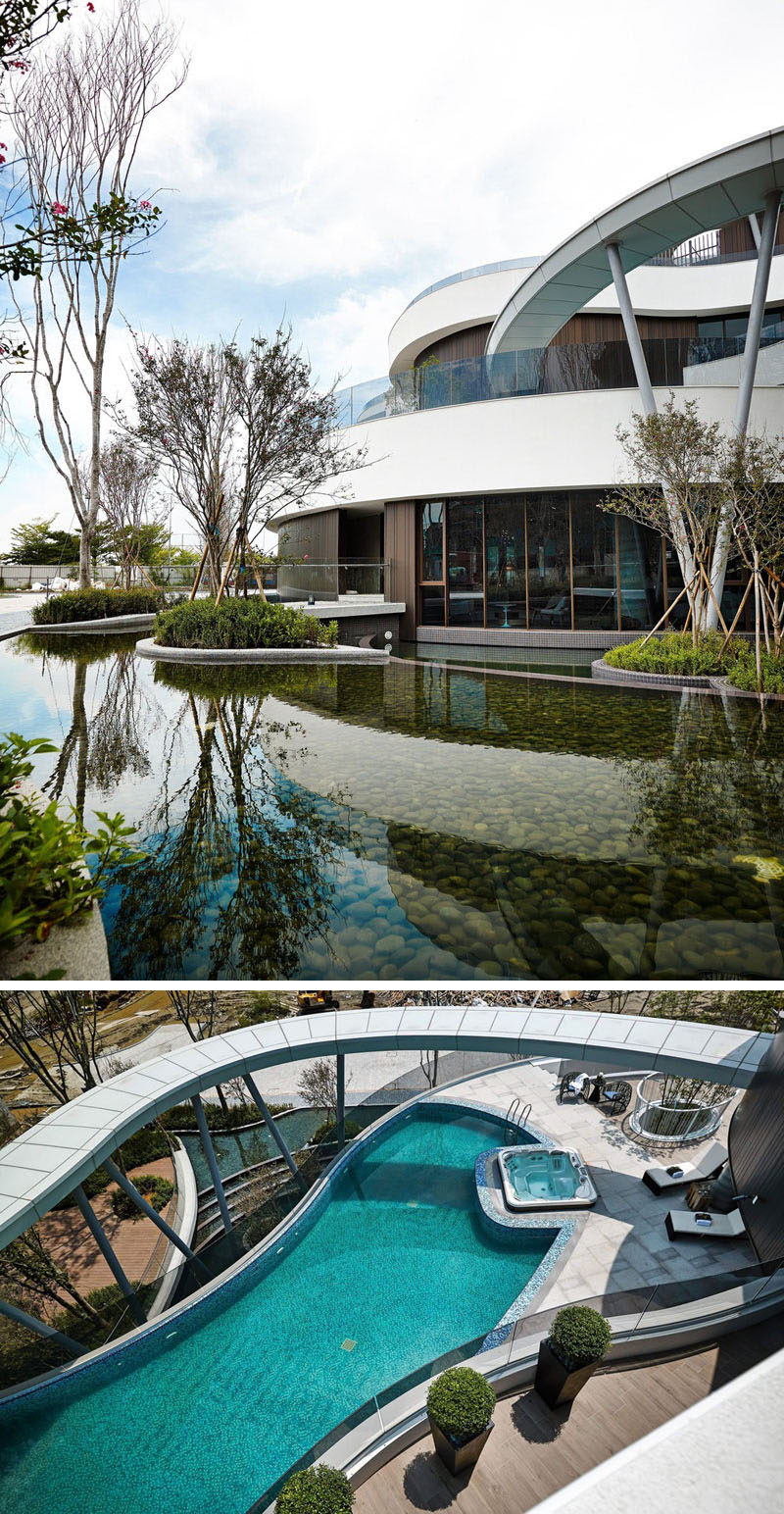 This clubhouse is surrounded by a landscaped pond, that can also be seen from the swimming pool, located on a different level of the building.