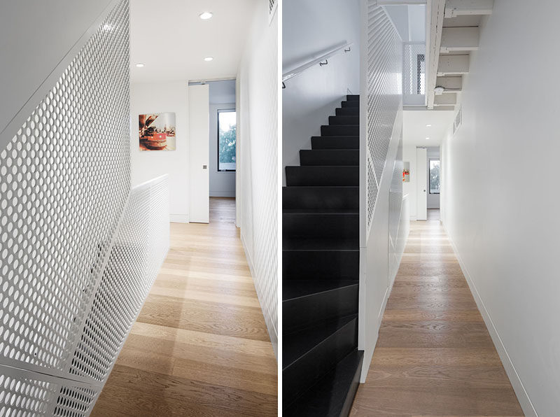 A white mesh steel screen has been used as a safety barrier for these dark stairs.