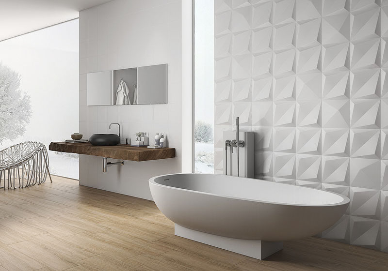 Bathroom Tile Ideas - Install 3D Tiles To Add Texture To Your Bathroom // Large 3-dimensional tiles on the wall just behind the bathtub add just the right amount of texture to the bathroom and give it a luxurious feel.