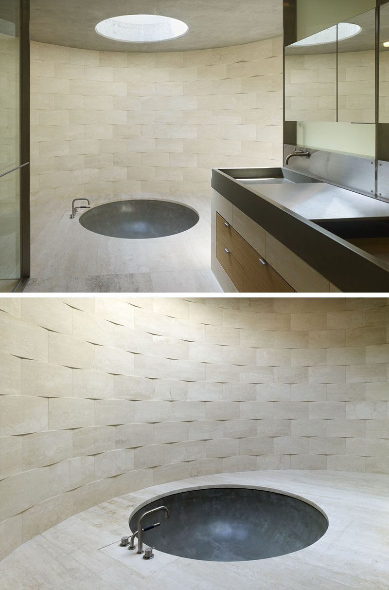 Bathroom Tile Ideas - Install 3D Tiles To Add Texture To Your Bathroom // The slightly curved tiles on the walls of this bathroom have been arranged so that you can clearly see their unique shape that gives the bathroom a textured look.