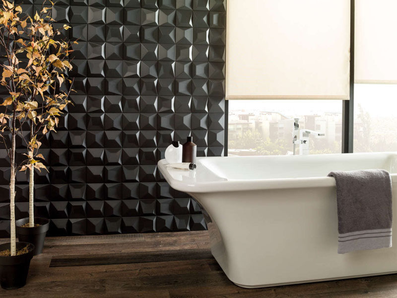 Bathroom Tile Ideas - Install 3D Tiles To Add Texture To Your Bathroom // Dark 3D tiles like these seem less harsh with the natural light hitting them and being reflected from different angles.