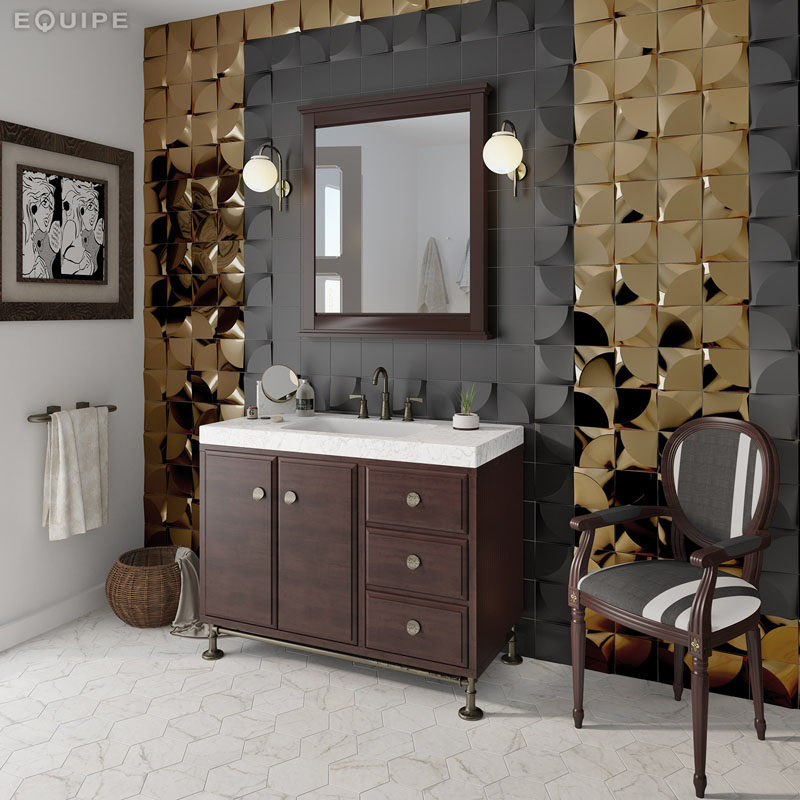 Bathroom Tile Ideas - Install 3D Tiles To Add Texture To Your Bathroom // The contrast of matte black and shiny gold 3D tiles around the vanity of this bathroom creates a sophisticated look that's both masculine and feminine.