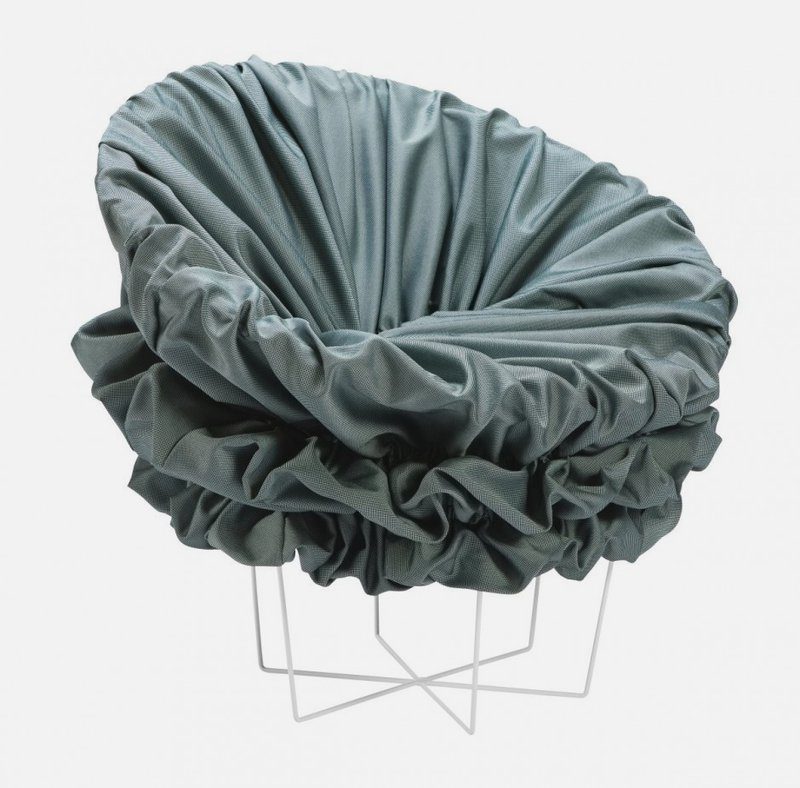 Furniture Ideas - 28 Accent Chairs For A Dramatic Living Room // Fabric has been tucked into the metal folds of this chair to give it a full and ruffled look.