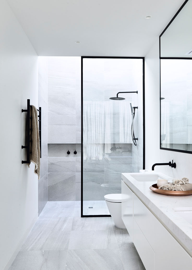 Bathroom Design Ideas - Black Shower Frames // The black frame around the glass of the shower matches the black frame around the mirror as well as the black hardware used throughout the rest of the bathroom.