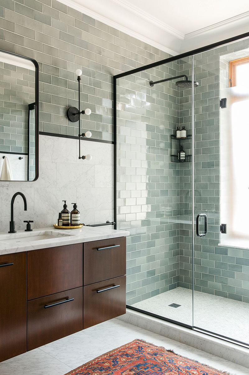 Bathroom Design Ideas - Black Shower Frames // The black elements of this bathroom including the black framed shower tie the space together and create a unified, cohesive look.