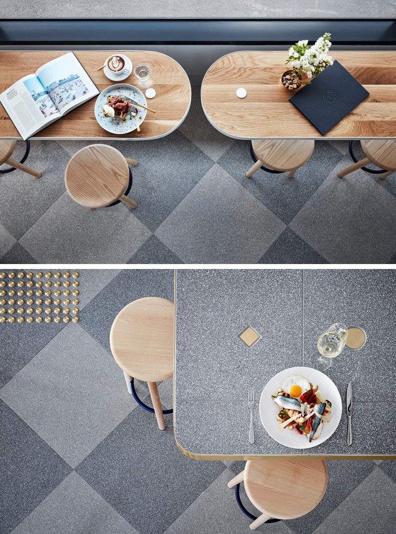 The designers used Terrazzo flooring in this cafe and it has been laid in a traditional checkerboard pattern for added interest.