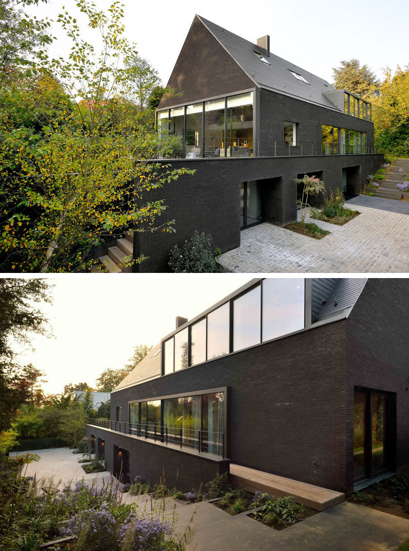 Architecture firm K2A have designed the renovation of a 1960s two-storey brick villa in Brussels, Belgium, which was originally white, and transformed it into this contemporary black house.