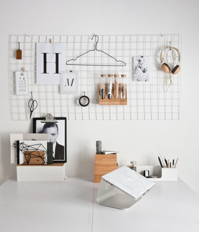 Desk Organization Ideas - 6 Easy Ways You Can Organize Your Desk To Make It More Inviting // Use your wall as an additional storage space.