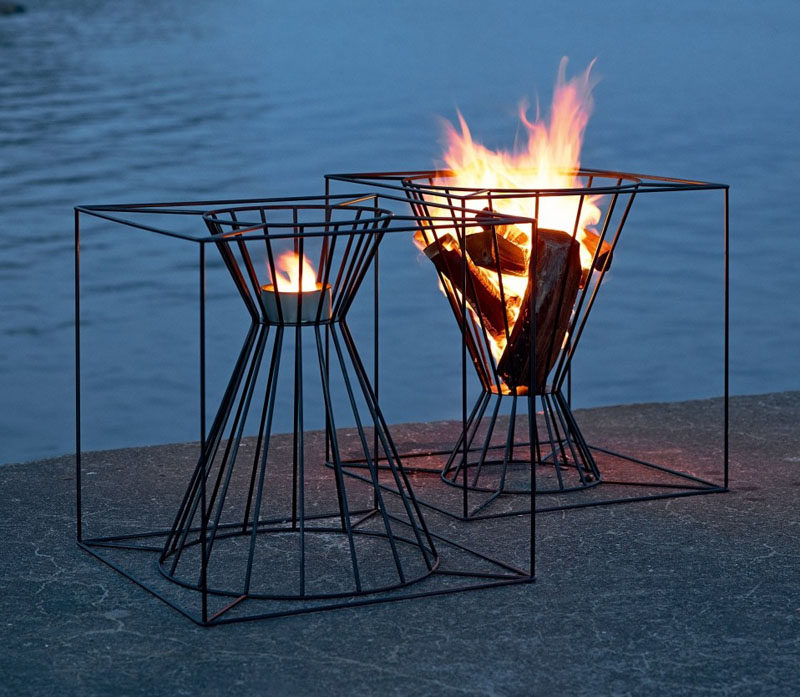 Warm Up Your Life With These 13 Freestanding Fireplace Designs // These steel fire baskets allow you to use either end of them to create fires of different sizes.