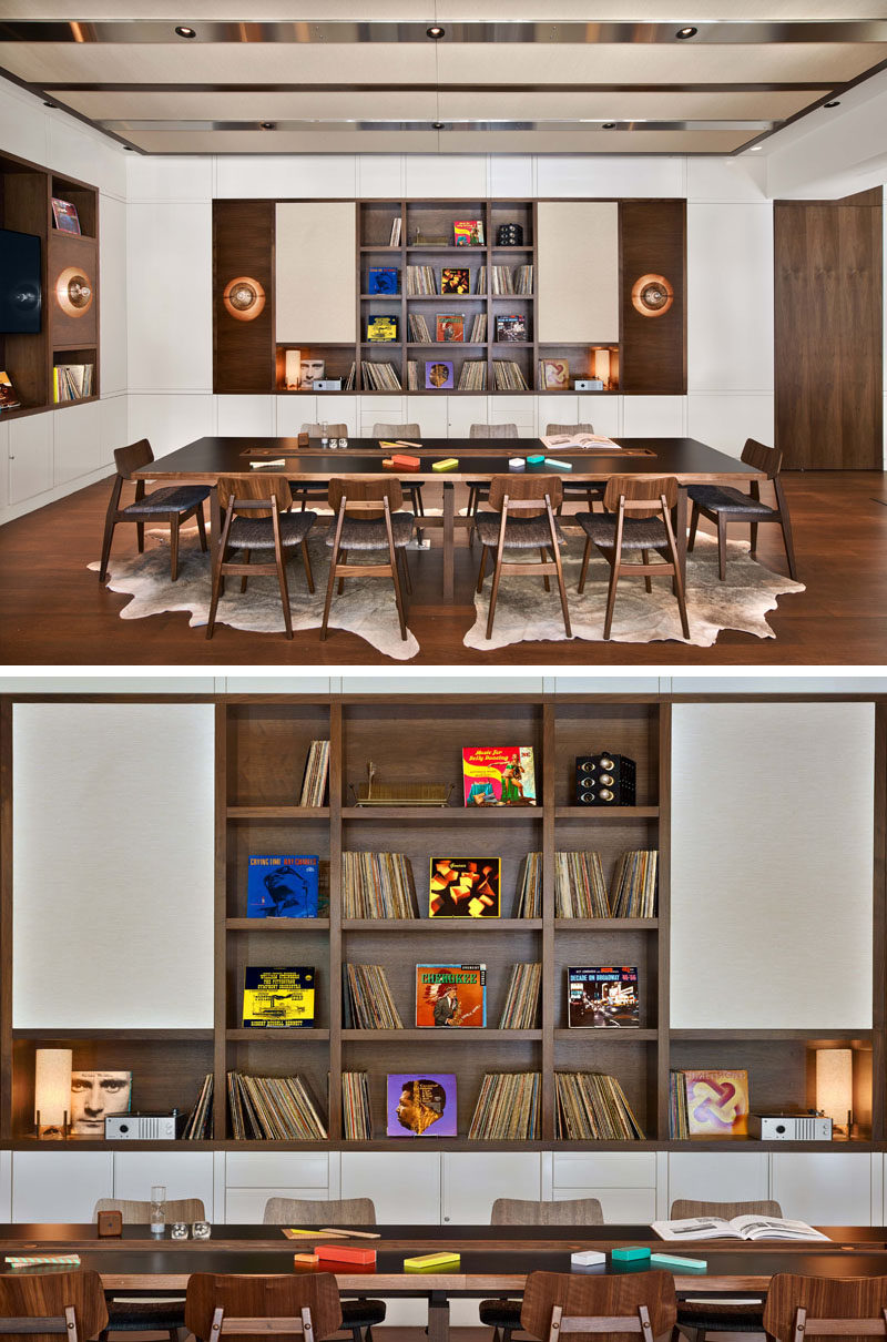 In the game room at the Arlo Hudson Square hotel, guests can gather and socialize with others. Built-in shelving inspired by 1960's speaker cabinets, are home to vinyl records and a turntable with headphones, games and puzzles.