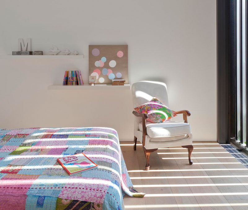 In the kids rooms, soft colors and light wood floors brighten up the room and add a touch of whimsy,