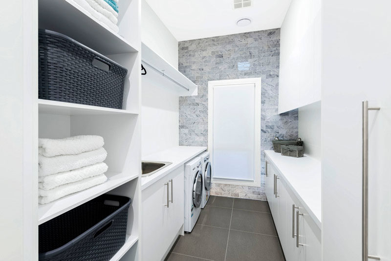 7 Laundry Room Design Ideas To Incorporate Into Your Own Laundry // Use baskets for organization