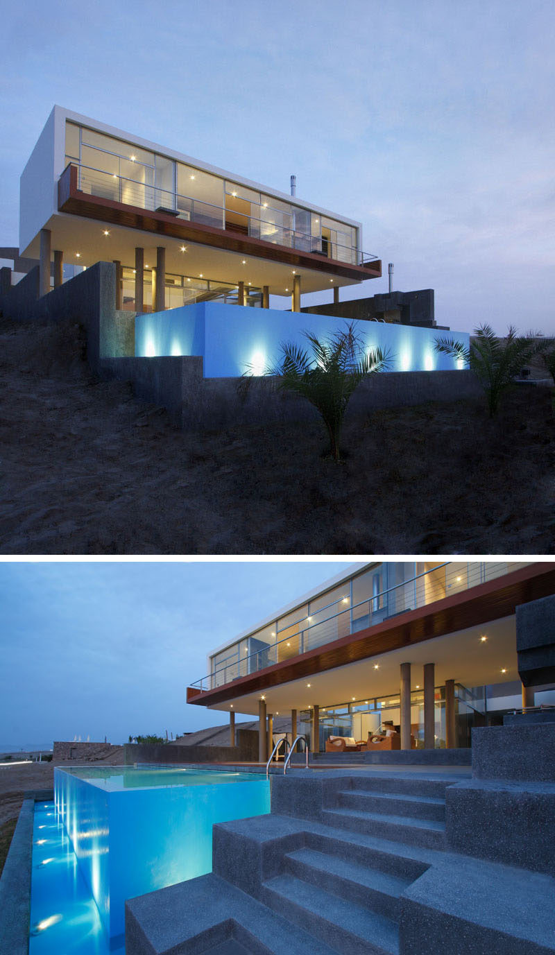 14 Examples Of Modern Beach Houses // The pool at the front of this contemporary beach house in Peru is contained in a cube that overlooks the Misterio Beach and out to the sea beyond.