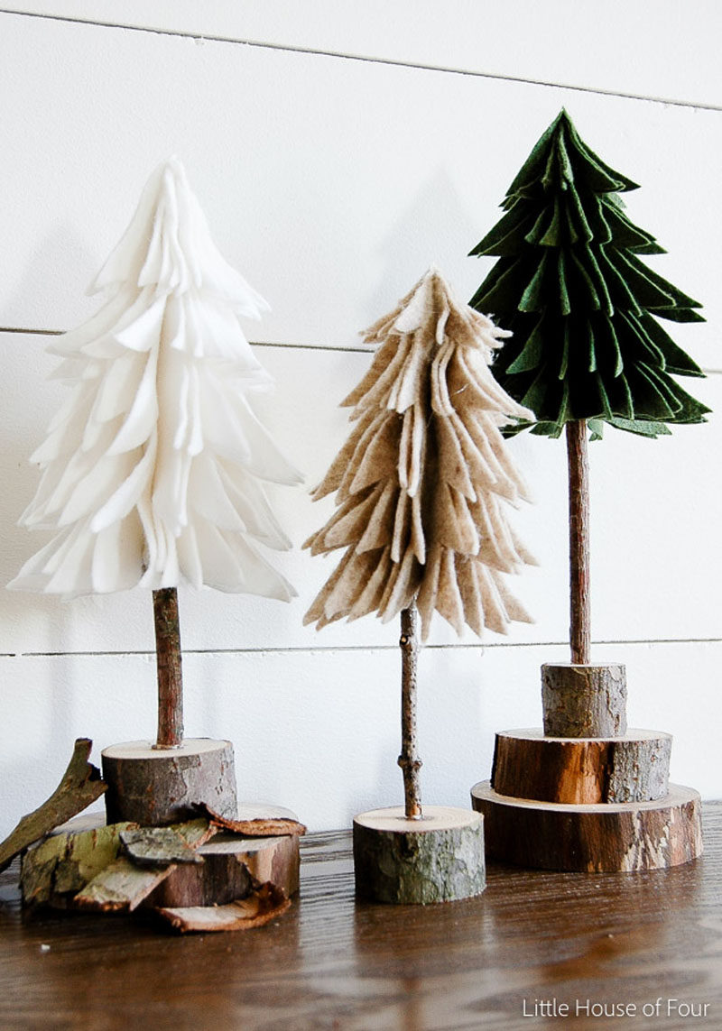 30 Modern Christmas Decor Ideas For Your Home // These felt and wood trees bring a bit of nature into your decor and help make your space feel warmer and more inviting.