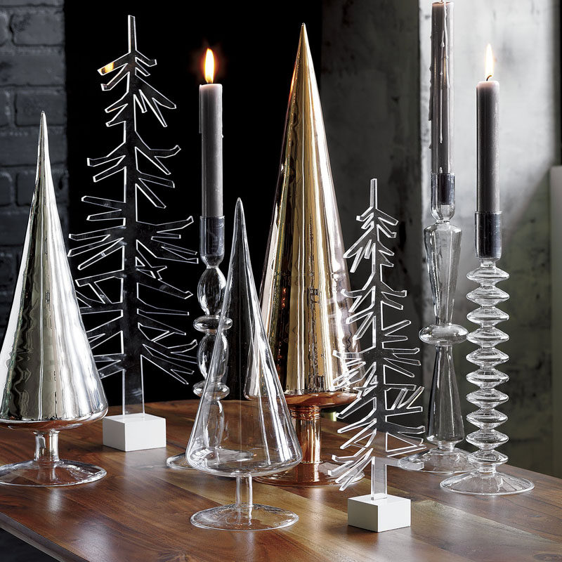 30 Modern Christmas Decor Ideas For Your Home // Glass trees organized on a table or mantle create a modern forest right inside your home.