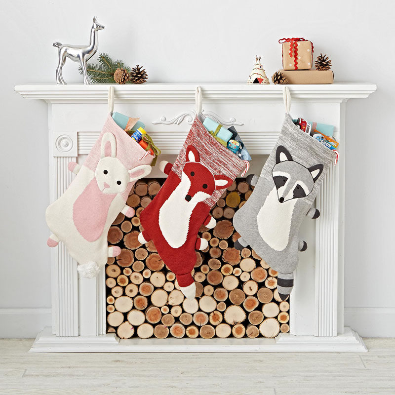 30 Modern Christmas Decor Ideas For Your Home // These woodland stockings are an adorable addition to the mantle and are just the right size for tucking in a few Christmas treats.