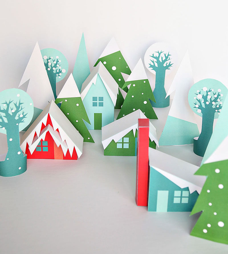 30 Modern Christmas Decor Ideas For Your Home // This printable paper village in fun colors with modern houses makes for a fun winter scene that be used over and over throughout the years.