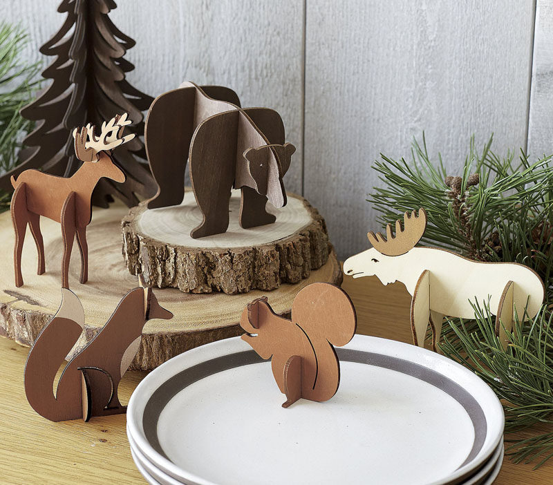 30 Modern Christmas Decor Ideas For Your Home // These laser cut wood animals are the perfect additions to your winter scenes.