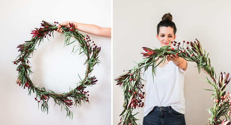 21 Modern Wreaths To Decorate Your Home With This Holiday Season // The eucalyptus trend is still going strong, get in on it this holiday season with a wreath made from eucalyptus leaves and a few well placed berries.