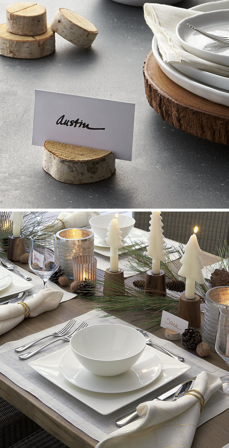 15 Inspirational Ideas For Creating A Modern Christmas Table Full Of Natural Elements // Thinly sliced wood stumps add a simplistic natural touch to the table and are perfect for clearly displaying name cards.