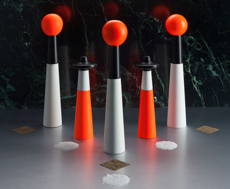 Essential Kitchen Tools - Salt and Pepper Mills // Add some architecture to your kitchen table with these tower grinders painted with white and fluorescent safety orange.