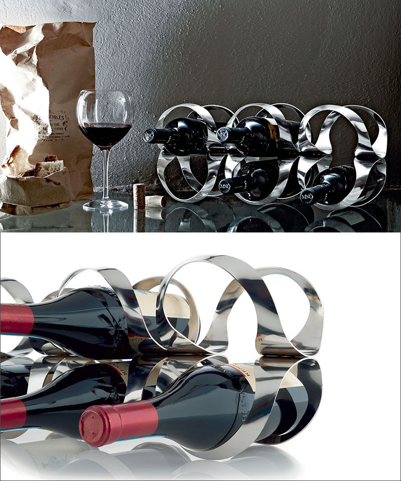 13 Wine Bottle Storage Ideas For Your Stylish Home // This sculptural wine rack makes your wine bottles part of a unique visual display that can sit right on your kitchen counter.