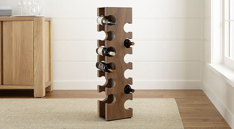 13 Wine Bottle Storage Ideas For Your Stylish Home // This standing wood wine rack holds 12 bottles of wine comfortably and keeps them off both the counters and the walls.