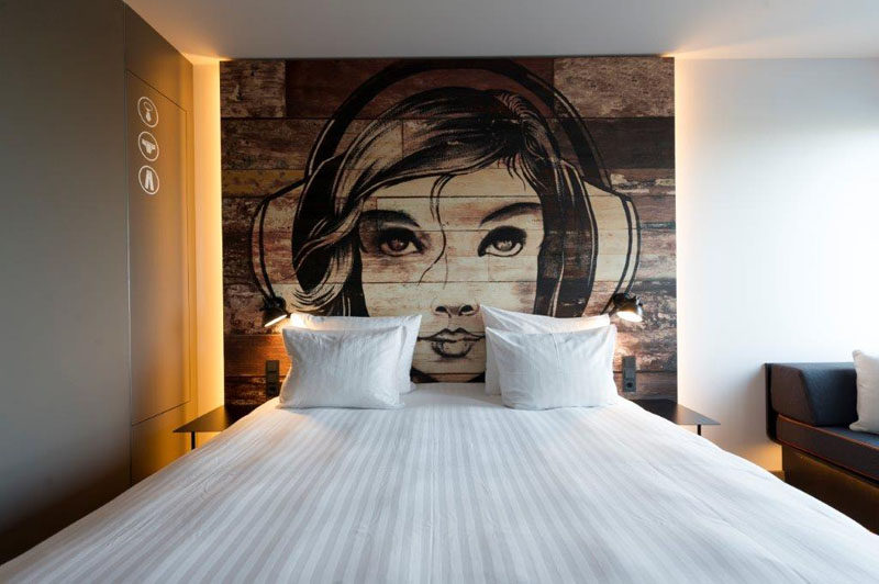 Hotel Room Design Ideas To Use In Your Own Bedroom // Include some art and paint a mural on the wall behind your bed