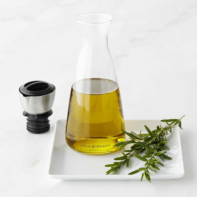 Essential Kitchen Tools - 11 Creative Oil & Vinegar Dispensers // A simple beaker style jug with an adjustable spout means you'll get the perfect amount of oil every time.
