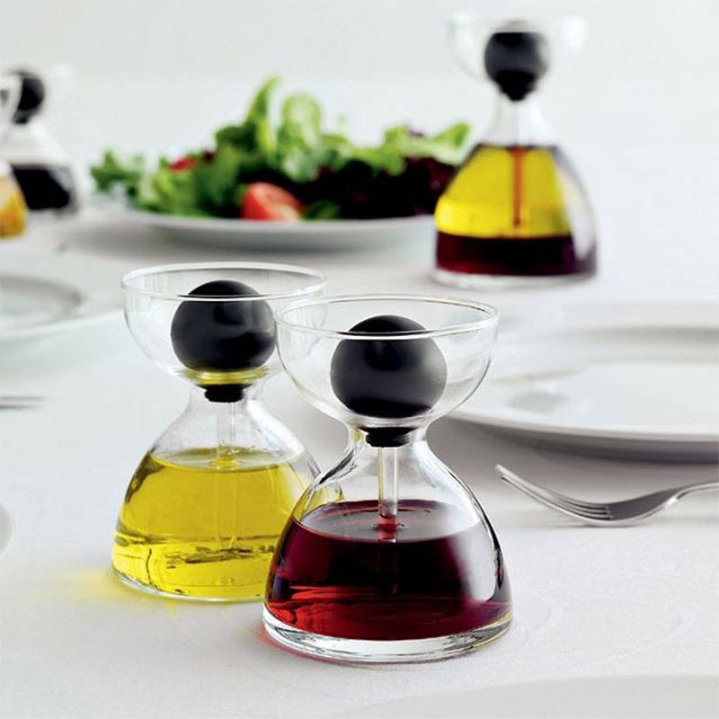 Essential Kitchen Tools - 11 Creative Oil & Vinegar Dispensers // Inject just a little bit of oil into your cooking with these oil holders that use a pipette to dispense the oil.