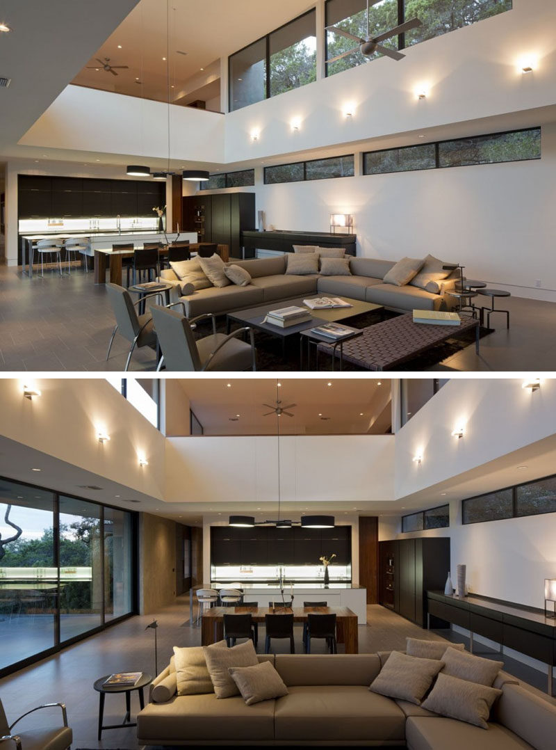 Inside this home, the main living and dining area has a double height ceiling making the space feel large and open.
