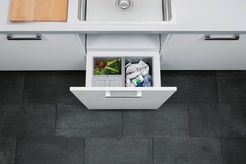 Kitchen Design Idea - Hide Pull Out Trash Bins In Your Cabinetry // Multiple bins in this built in drawer system make sorting and organizing food waste, garbage and recycling much easier.