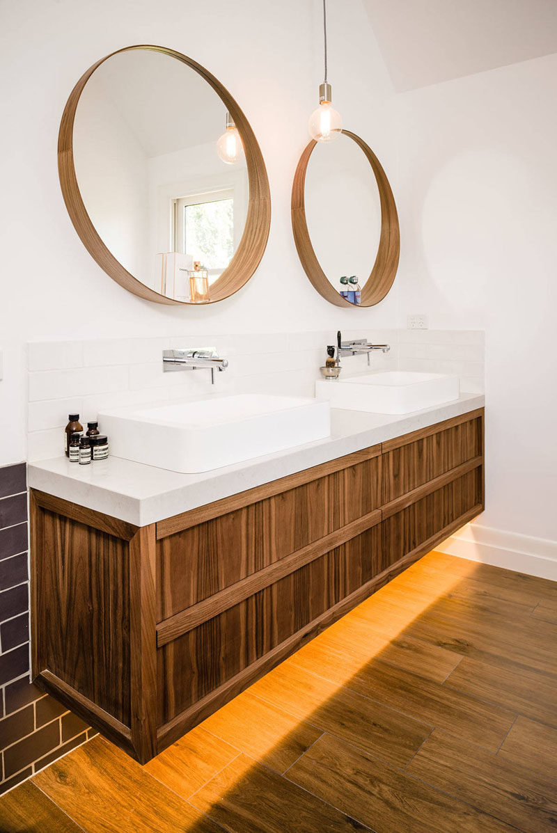 5 Bathroom Mirror Ideas For A Double Vanity // Two circular mirrors are a simple way to make your bathroom slightly more unique and can break up a bathroom dominated by hard, solid lines.