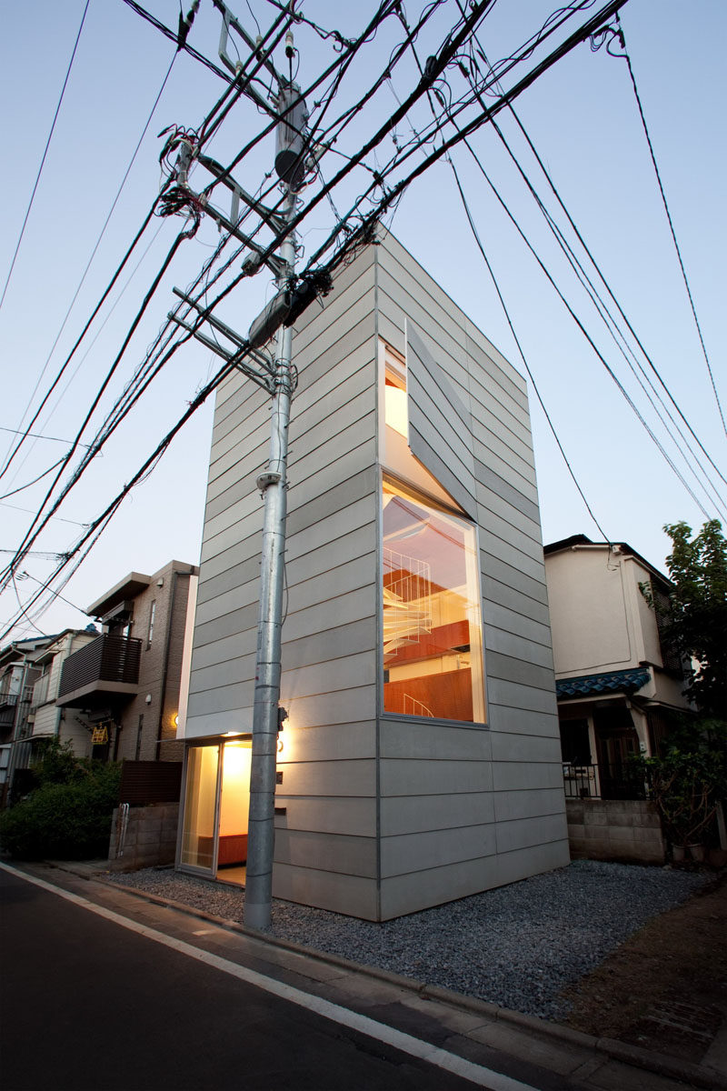 11 Small Modern House Designs // This tiny narrow house is spacious enough on the inside to comfortably fit a family of three.