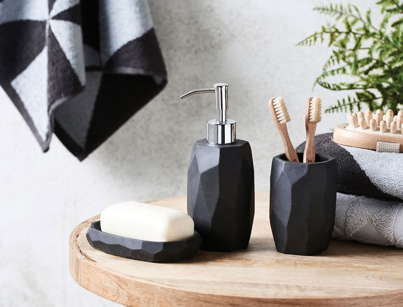 Bathroom Decor Ideas- Sophisticated Soap Dispensers // The geometric look of this soap dispenser makes it great for modern spaces while the dark grey color gives it a grown up feel.