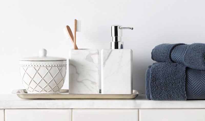 Bathroom Decor Ideas- Sophisticated Soap Dispensers // A simple white marble soap dispenser adds class to your counter and makes washing your hands feel like a luxury.