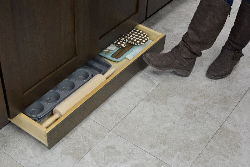 Kitchen Design Idea - Toe Kick Drawers // Great for storing baking equipment.